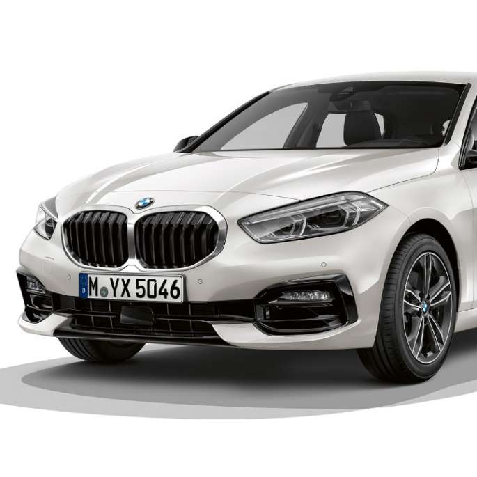 BMW 1 Series Model Sport Line, three-quarter front. BMW 1 Series Model Sport Line in Mineral White metallic, studio shot three-quarter front.