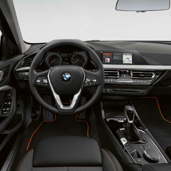 Sport leather steering wheel. BMW 1 Series Model Sport Line, cockpit with Sport leather steering wheel.