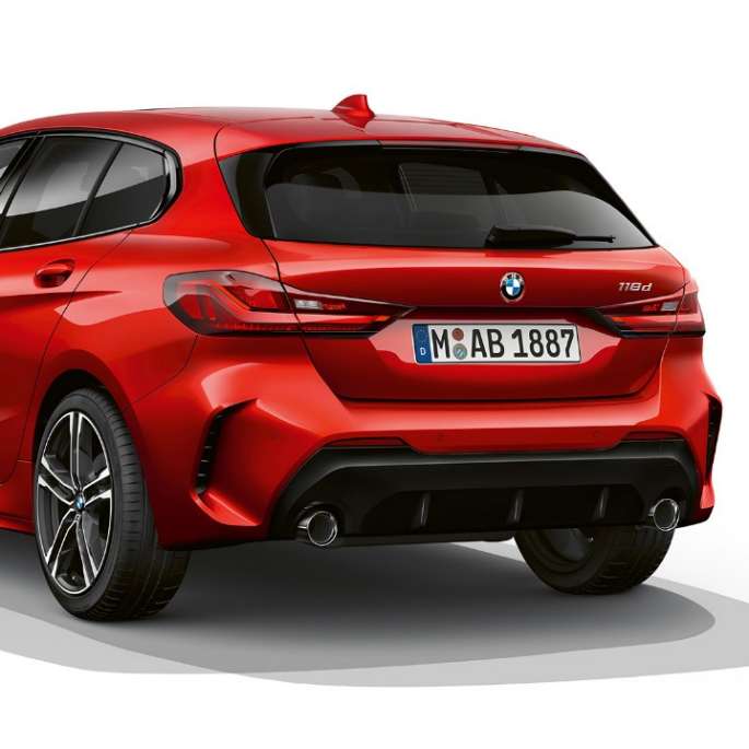 BMW 1 Series Model M Sport, three-quarter rear. BMW 1 Series Model M Sport in Melbourne Red metallic, studio shot three-quarter rear.