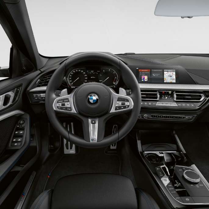 M Leather steering wheel. BMW 1 Series Model M Sport, cockpit with M Leather steering wheel.