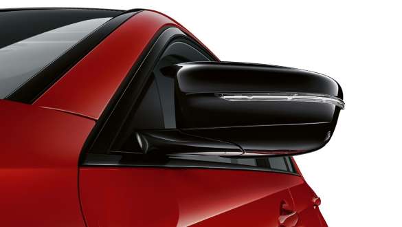 M exterior mirror in Black high-gloss BMW M5 Competition F90 LCI Facelift 2020 close-up M exterior mirror in Black high-gloss BMW M5 Competition F90 LCI Facelift 2020 BMW Individual Imola Red close-up