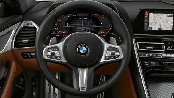 M leather steering wheel. Cockpit of the BMW M850i xDrive Coupé with M leather steering wheel.