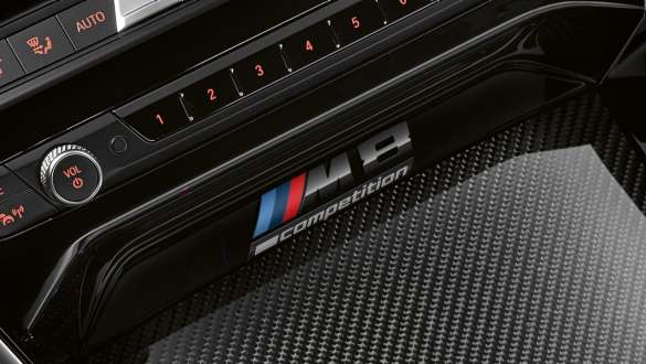 M8 Competition Badge. BMW M8 Competition Coupé, centre console with M8 Competition Badge.