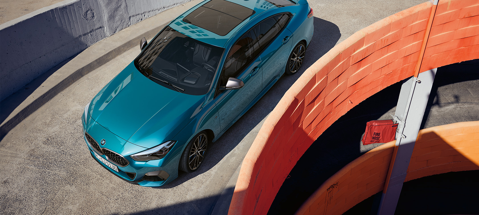 BMW 2 Series Gran Coupé F44, three-quarter front view from above BMW 2 Series Gran Coupé F44 Snapper Rocks Blue metallic, three-quarter front view from above on the roof