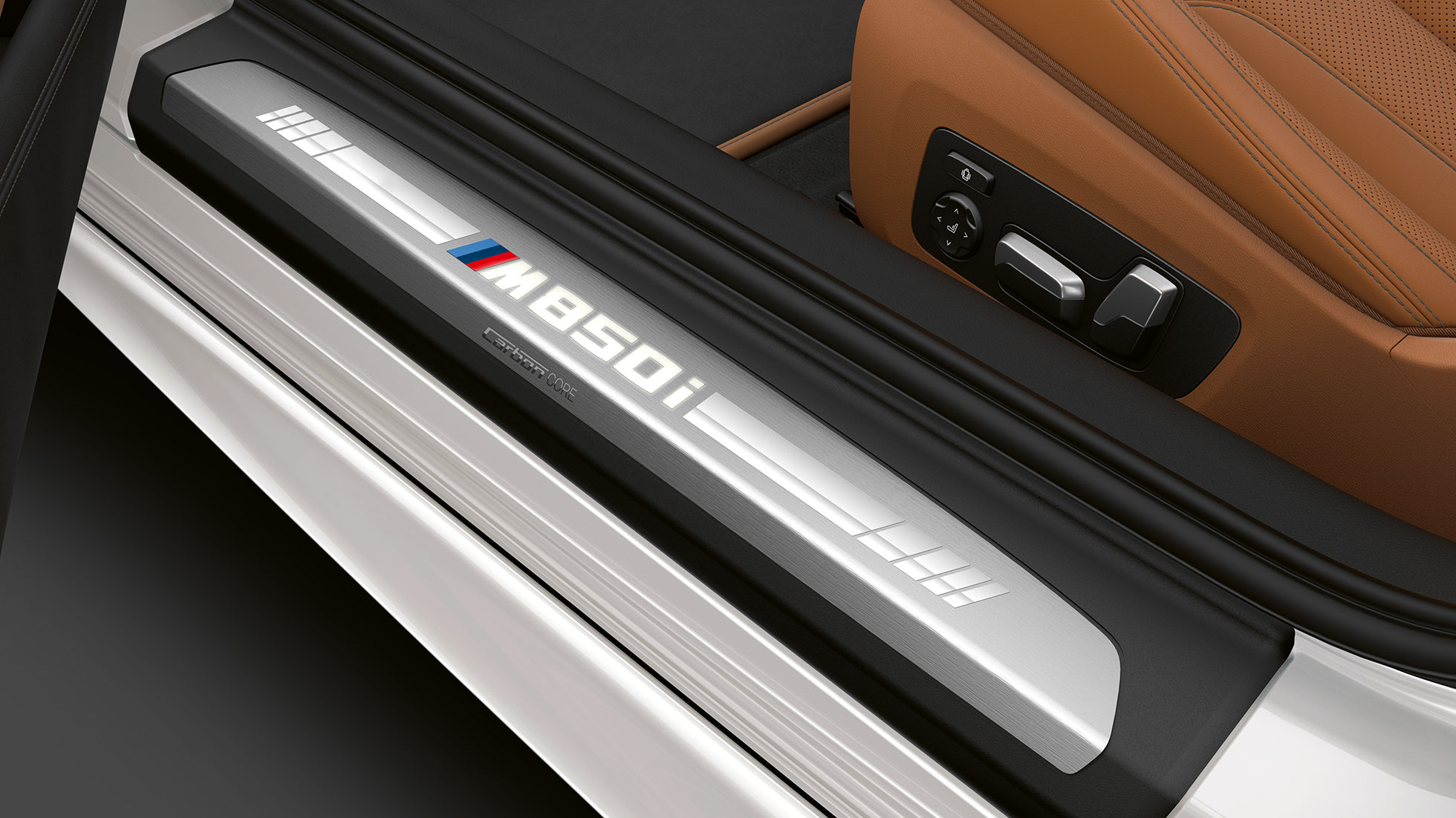 BMW M850i xDrive, Mineral White metallic, entry door sill. BMW M850i xDrive, Mineral White metallic, entry door sill.