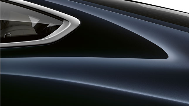 Close-up of the C pillar of the BMW 8 Series Coupé in Carbon Black metallic.