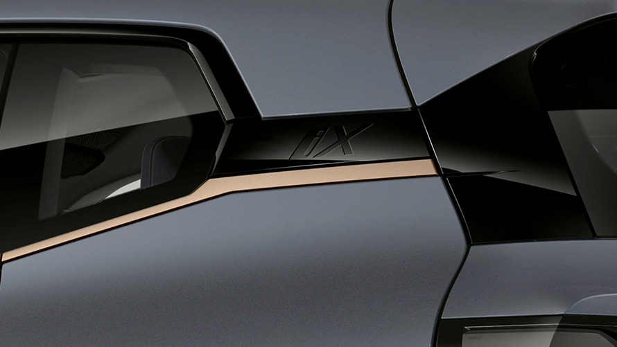 BMW iX M60 i20 2022 electric SUV BMW Individual Storm Bay metallic detail view iX designation Hofmeister kink BMW Individual Exterior Line Titanium Bronze