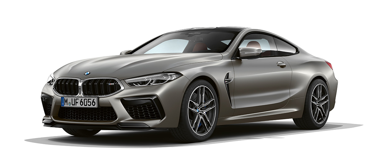 BMW M8 Coupé, three-quarter side view front. BMW M8 Coupé in Frozen Dark Silver, three-quarter side view with front.