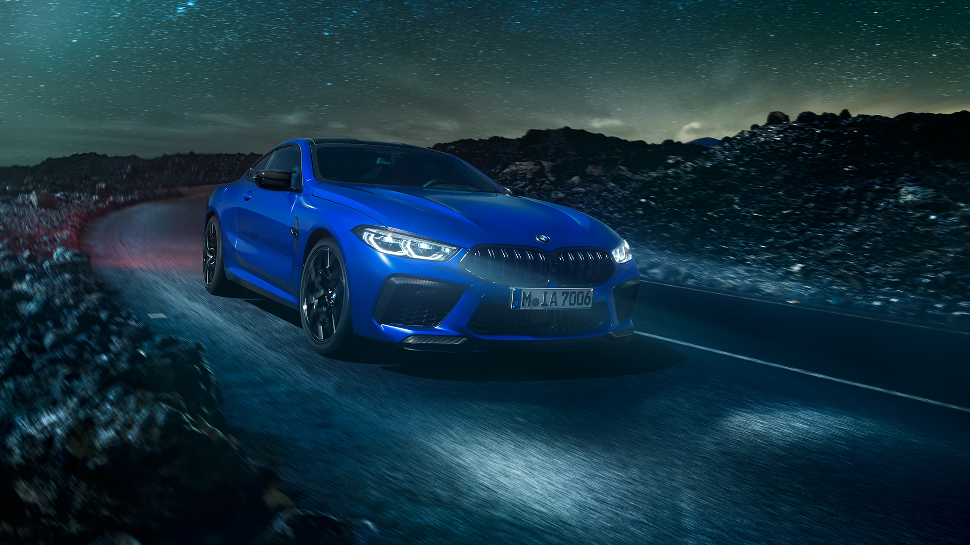 BMW M8 Competition Coupé. The first-ever BMW M8 Competition Coupé in Marina Bay Blue metallic, three-quarter front view.