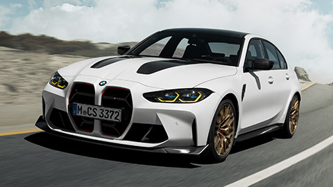 BMW M Series BMW M3 G80 front view dirivng on the street