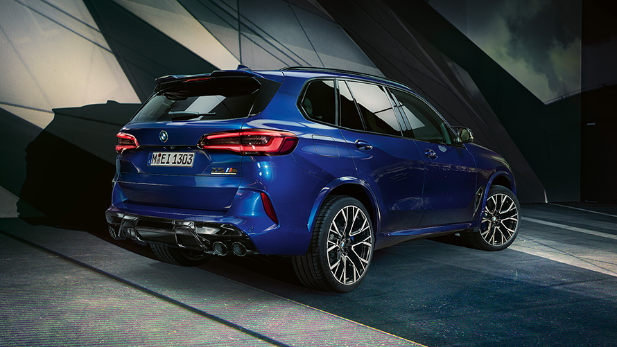 BMW X5 M Competition with M light alloy wheels F95 2020 SUV Marina Bay Blue metallic side view