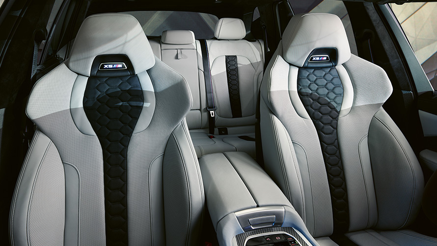 M Multifunctional seats with illuminated X5 M logo BMW X5 M Competition F95 2020 SUV interior