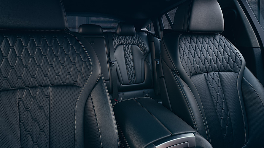 Interior with sport seats of the BMW X6 M50i M50d G06 2018 SUV
