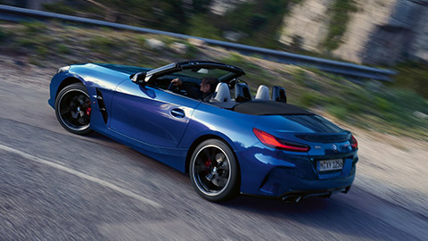 BMW Z4 M40i Roadster (G29) three-quarter front view driving BMW Z4 M40i Roadster (G29) three-quarter front view driving