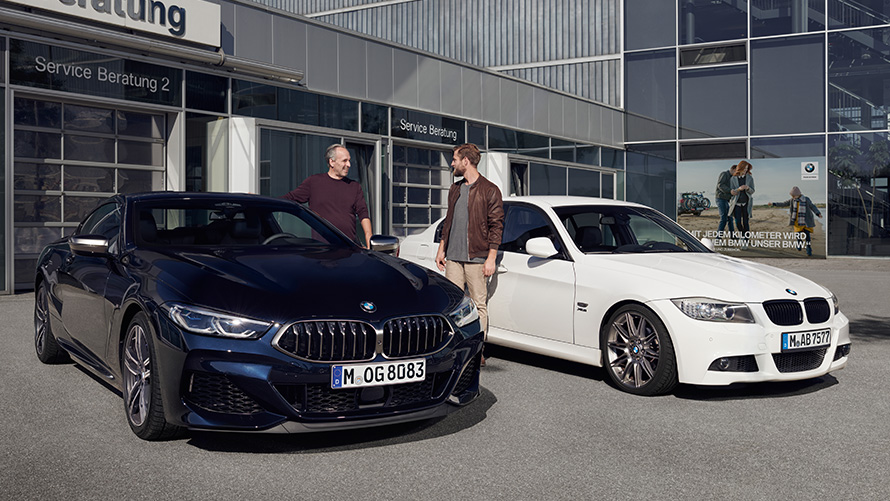 BMW vehicles in front of building with BMW Service Consulting  BMW Spring Summer Accessories BMW vehicles in front of building with BMW Service Consulting